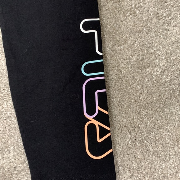 Never worn Fila leggings! Black leggings with Fila logo on left pant leg. - Picture 2 of 3